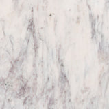 Formentera Dining Table - Elegant Handcrafted Marble Design with Unique Shape for Modern Spaces