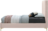 Geri Black Velvet Bed with Piping and Gold & Chrome Legs for a Stylish Contemporary Bedroom Design