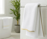White Towels Bath with Beige Edge