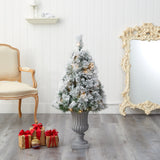 44” Flocked Oregon Pine Artificial Christmas Tree with 50 Clear Lights and 113 Bendable Branches in Decorative Urn