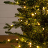 4.5' Pre-Lit Artificial Christmas Tree in Decorative Planter with 400 LED Lights