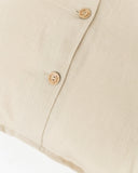 Deco pillow cover with buttons in Natural linen