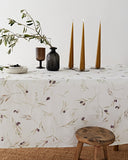 Olive orchard print on white linen tablecloth