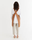 Pinafore cross-back linen apron in Cinnamon