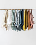 Ruffle trim linen tea towel in Matcha green