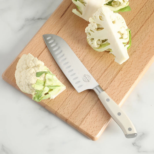 Sur La Table Kitchen Essentials Tasting Kitchen German Steel Santoku Knife, 7-Inch Stainless Steel Blade – Professional Kitchen Knife with White Handle and Forged Full Tang