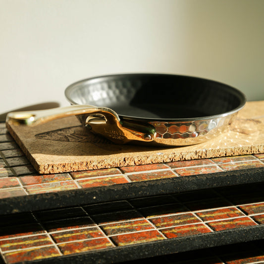 Mauviel M'ELITE B Hammered 5-Ply Nonstick Frying Pan With Brass Handle