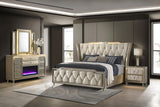 Modern bedroom with a tufted bed, nightstands, and dresser.