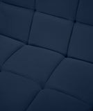 Relax Contemporary Armless Chair with Soft Upholstery, Biscuit Tufting & Modular Design for Versatility
