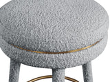 Coral Contemporary Swivel Bar Stool with Luxurious Boucle Upholstery and Elegant Gold Accents