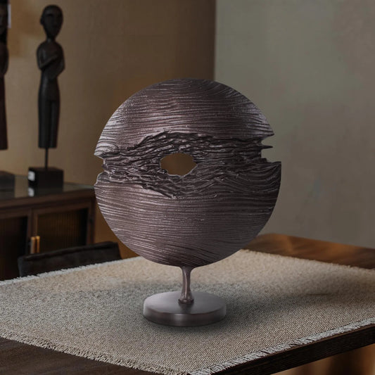 Berken Round Sculpture in a Bronze Finished Cast Aluminum