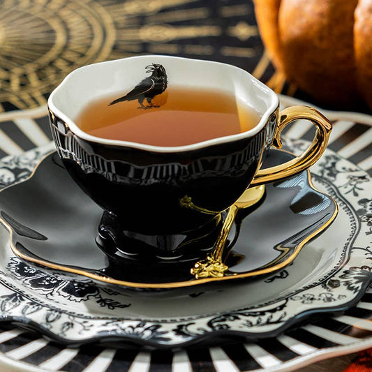 Raven Black Gold Porcelain Tea Cup & Saucer