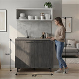 Napoles Utility Sink with Faucet Inclued and Integrated Steel Counter top, Freestanding cabinet with two doors, Metal Handles and Two interior shelves.