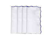 White scalloped napkins for weddings