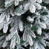 4' Pre-Lit Artificial Flocked Christmas Tree with 100 Warm White LED Lights in Decorative Trunk Planter