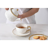 White Porcelain Teacup & Saucer with Silver Rim