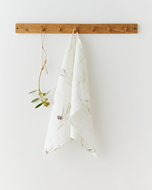 Linen tea towel in Olive orchard print on white