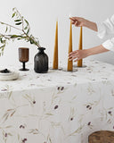 Olive orchard print on white linen tablecloth