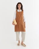 Pinafore cross-back linen apron in Cinnamon