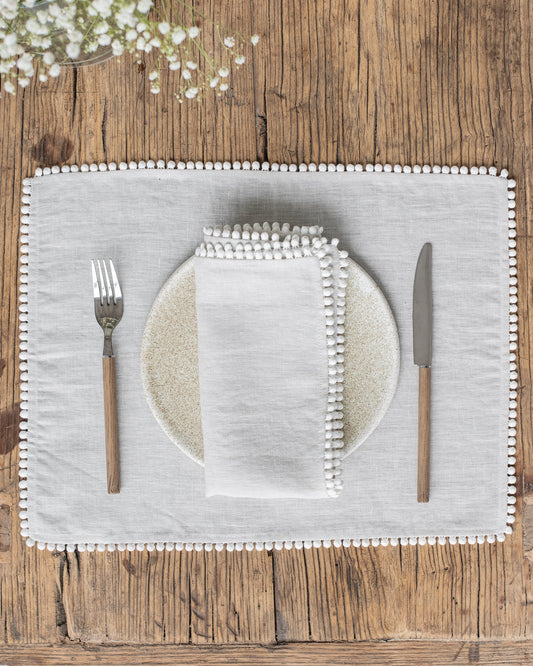 Pom pom trim linen napkin set of 2 in Light gray