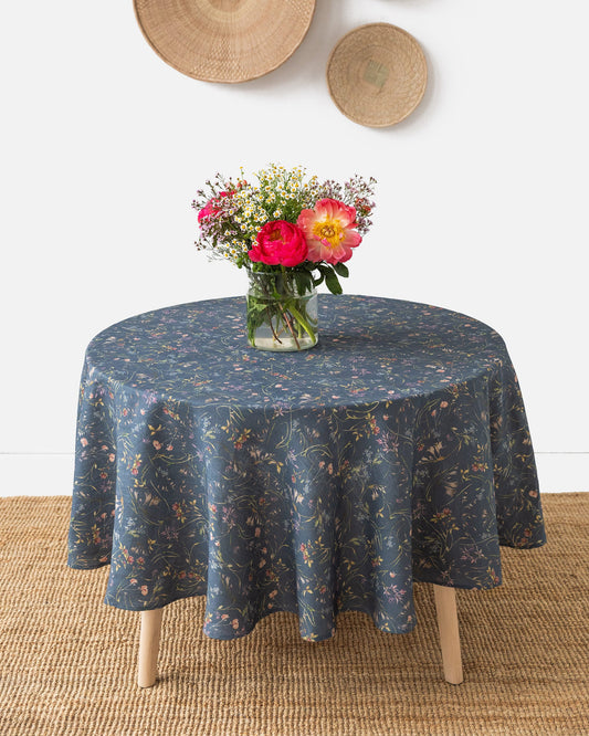 Round linen tablecloth in Wildflowers print on deep navy blue