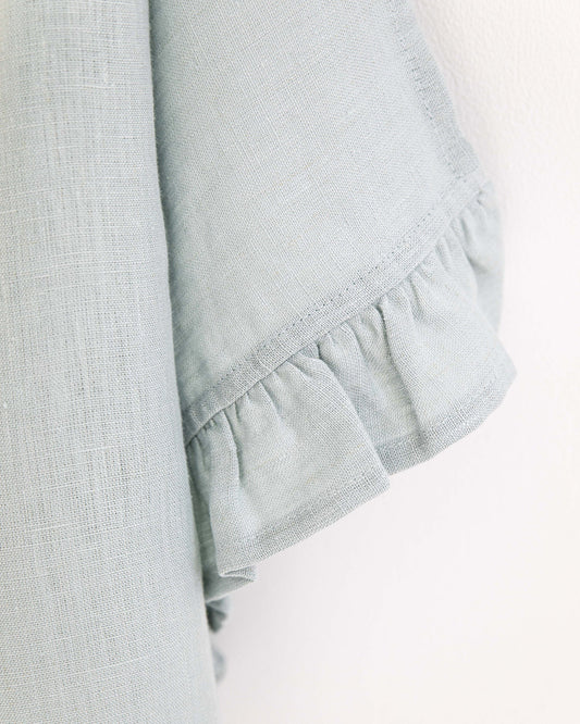 Ruffle trim linen tea towel in Dusty blue