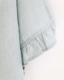Ruffle trim linen tea towel in Dusty blue