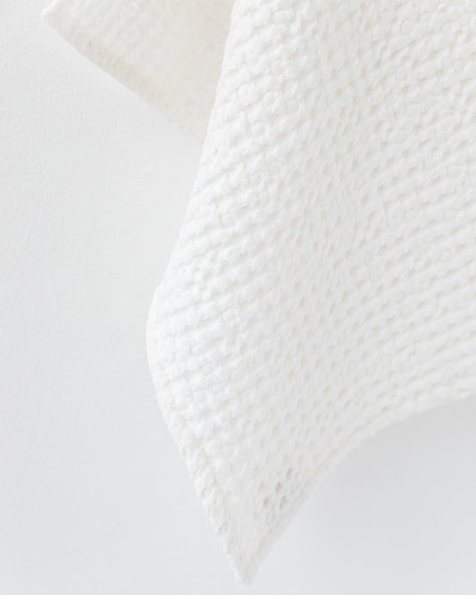 Waffle face towel in White